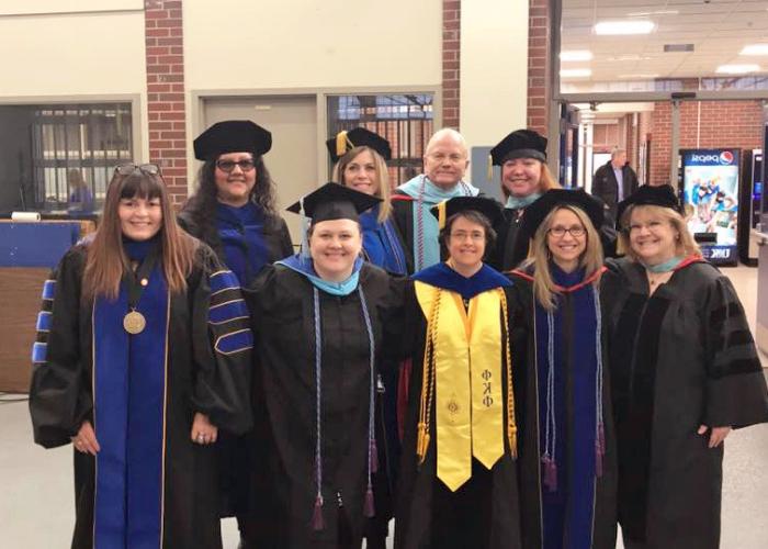 tcp faculty in commencement robes